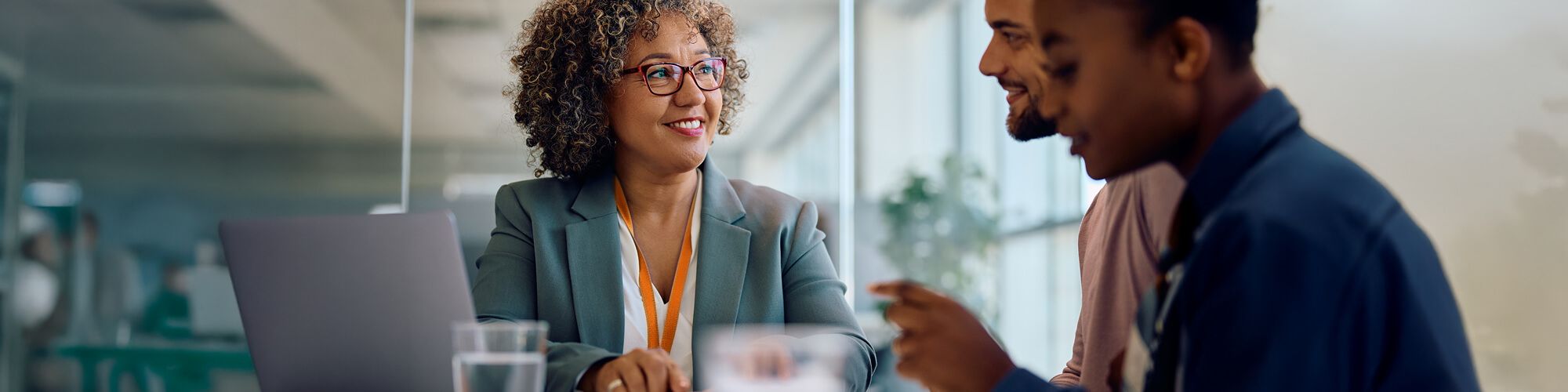 woman meeting with clients in office